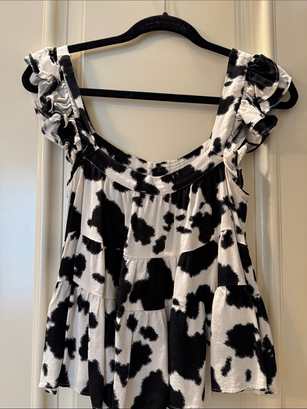 Black & White Cow Print Ruffle Sleeve Peplum Top